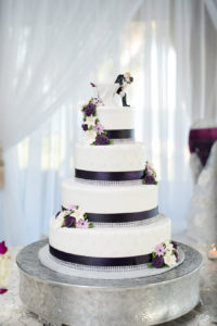 Four Tiered, White, Round Wedding Cake with Purple and Crystal Accents | Tampa Wedding Photographers Caroline and Evan Photography
