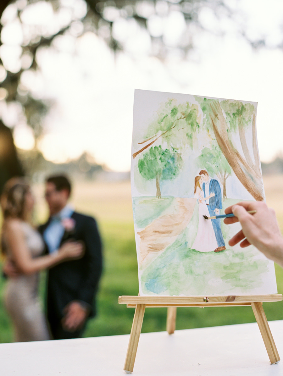 Outdoor Tampa Wedding Portrait of Bride and Groom with Watercolor Portrait Artist