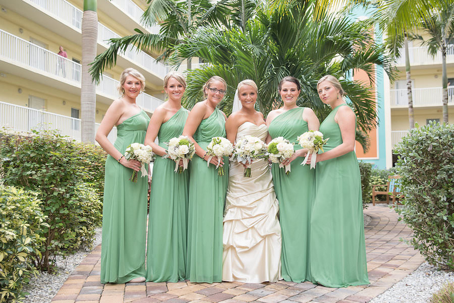 Bridal Party Wedding Portrait Wearing Green One Shoulder Long Bridesmaid Dresses | St. Petersburg Wedding Photographer Kristen Marie Photography
