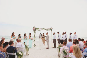 Waterfront Beach Wedding Ceremony | Bride and Groom Exchanging Vows | | Anna Maria Island Wedding Planner Exquisite Events