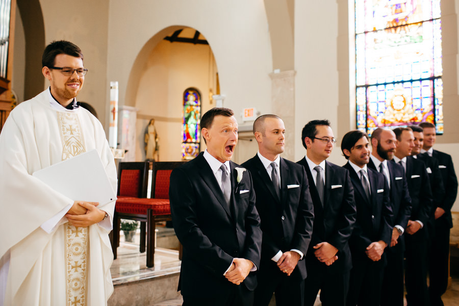 Groom Reaction to Seeing Bride Walk Down the Aisle at Sarasota Catholic Church Wedding Ceremony at St. Martha's Catholic Church