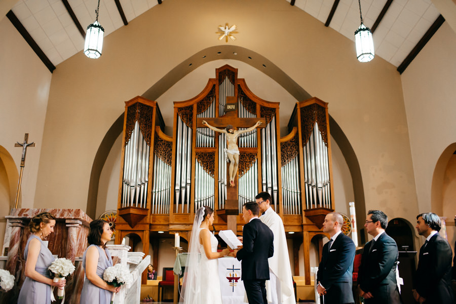 Catholic Church Wedding Ceremony, Bride and Groom Exchanging Vows