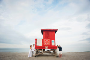 Outdoor, Waterfront Clearwater Beach Engagement Session with Lifeguard Stand | Clearwater Wedding Photographer Limelight Photography