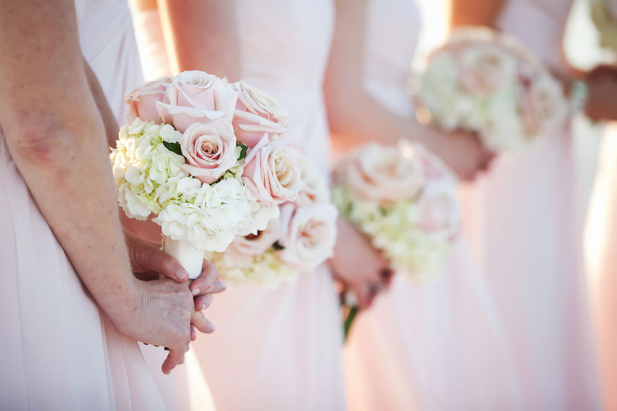 Bridesmaids in Blush Bridesmaids Dresses with White Hydrangea and Blush Pink Rose Bouquets | Clearwater Beach Wedding Photographer Limelight Photography