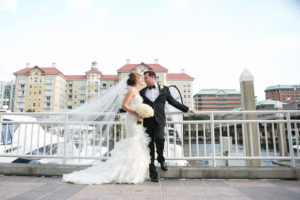 Bride and Groom Waterfront Downtown Tampa Wedding Portrait at Marriott Waterside | Wedding Bouquet by Northside Florist | Wedding Photographer Carrie Wildes Photography