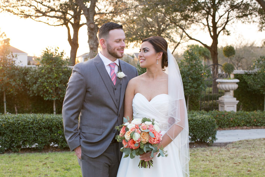 Outdoor, Bride and Groom Wedding Portrait in Grey Groom's Suit and Strapless, Ivory Wedding Dress | Tampa Wedding Photographer Carries Wiles Photography