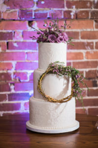 Three Tiered, Round, White and Lace Wedding Cake with Purple Flower Accents and Twig Wreath Detail | Tampa Wedding Cake Baker and Cake Artist Trudy Melissa Cakes