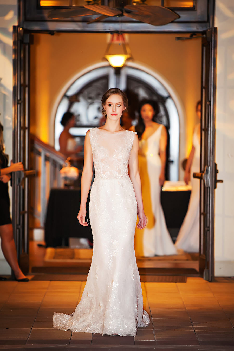 Marry Me Tampa Bay Wedding Week Fashion Show | Model in Lace Wedding Dress | Tampa Bridal Salon Isabel O'Neil Bridal | Wedding Photographer Limelight Photography