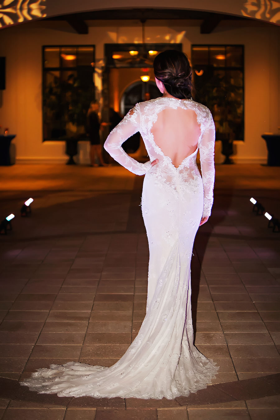 Marry Me Tampa Bay Wedding Week Fashion Show | Model in Lace Wedding Dress with Sleeves | Tampa Bridal Salon Isabel O'Neil Bridal | Wedding Photographer Limelight Photography