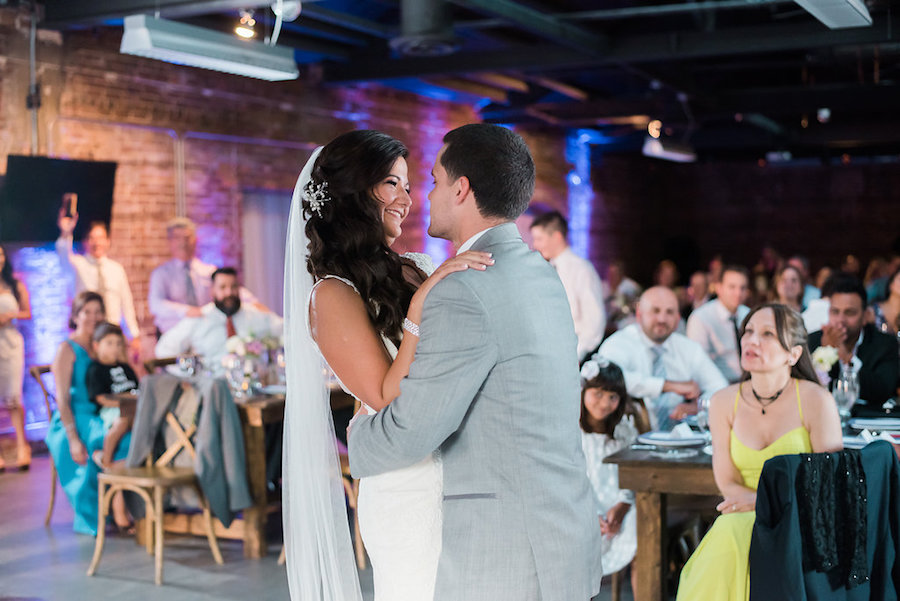 Bride and Groom First Dance with Exposed Brick Wall Venue | Unique Tampa Wedding Venue CL Space