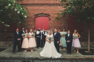 Bridal Party Wedding Portrait with Tulle Bridesmaids Skirts from Studio46Boutique in Tampa Florida and Allure Cap Sleeve Tulle and Lace Wedding Gown | Ybor City Wedding