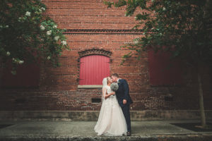 Outdoor Bridal Wedding Portrait in Lace and Tulle Wedding Dress with Paper Flower Wedding Bouquet | Historic Ybor City Tampa Wedding