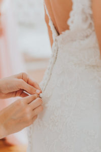 Bride Getting in Wedding Dress Detail, Lace, Ivory Wedding Dress