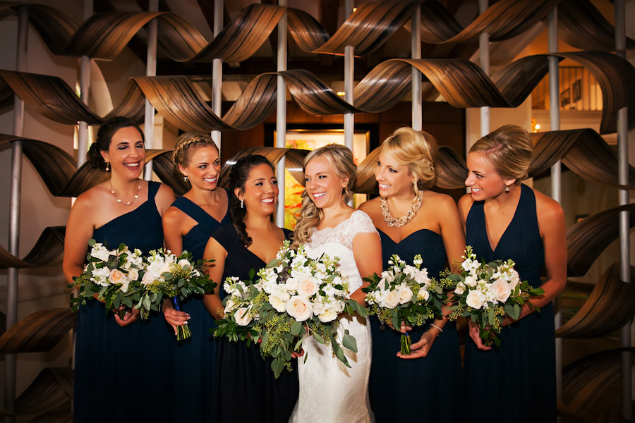 Bridal Party Wedding Portrait with Navy Bridesmaids Dresses and White, Cap Sleeve Lace Neckline Wedding Dress | St. Petersburg Wedding Florist Iza’s Flowers | St. Pete Wedding Hair and Makeup Artist Michele Renee The Studio | Wedding Planner Special Moments