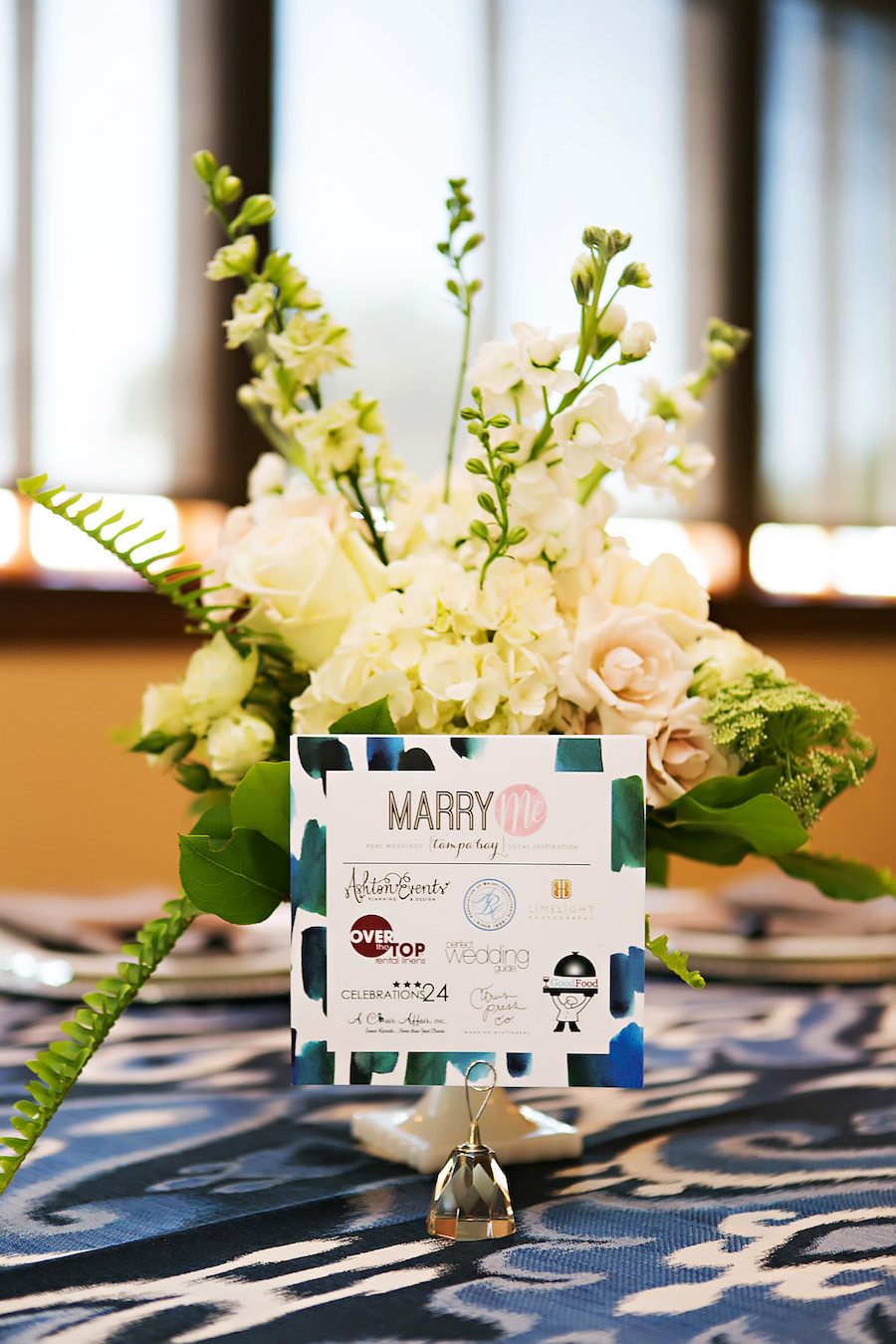 Tampa Bay/Lakeland/Sarasota Wedding Networking Event | White Wedding Floral Centerpiece with Hydrangeas, Pink Roses and Greenery and Navy Blue Linens | Over the Top Linen Rentals