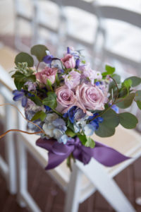 Purple and Pink Floral Ceremony Roses Flower Decor | Tampa Wedding Photographer Carrie Wildes Photography