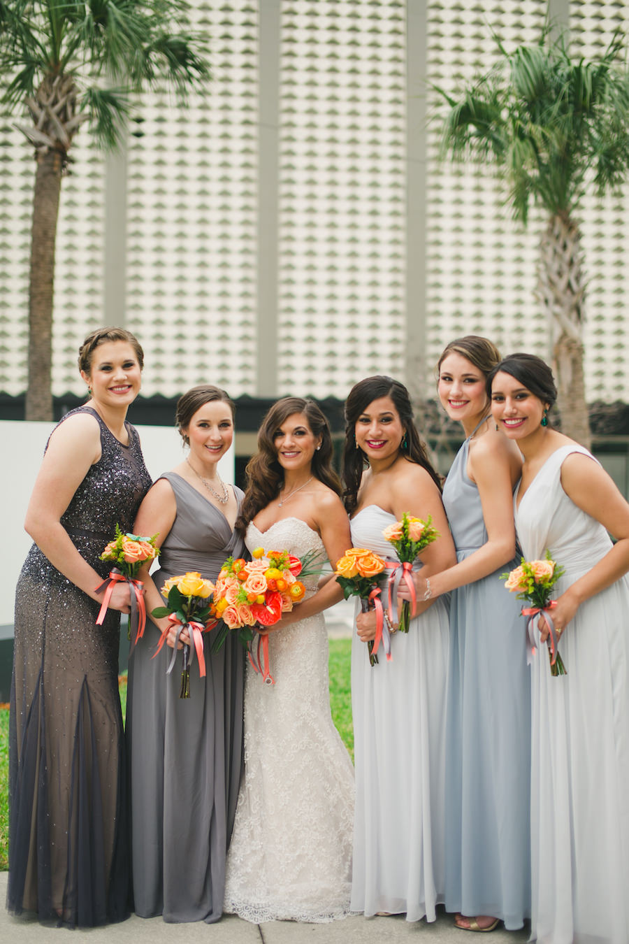 Bridal Party Wedding Portrait with Mismatched Grey Bridesmaids Dresses and Strapless Beaded Lace Wedding Dress from Isabel O’Neil Bridal Collection | Photography by Roohi Photography | Tampa Wedding Hair and Makeup by Lasting Luxe