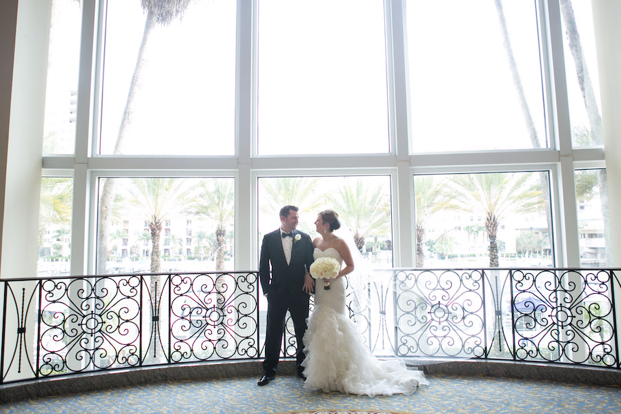 Downtown Tampa Bride and Groom Wedding Portrait at Marriott Waterside | Bride’s Wedding Bouquet by Northside Florist | Wedding Photographer Carrie Wildes Photography
