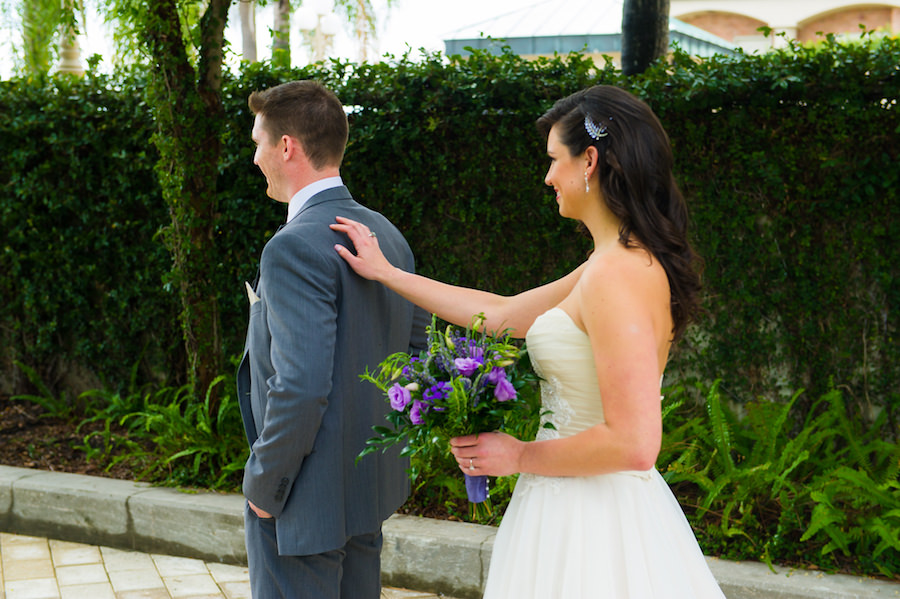Bride and Groom First Look Wedding Portrait | Purple and Green Wedding Bouquet by Apple Blossoms Floral Design | Downtown Tampa Wedding Photographer Kera Photography