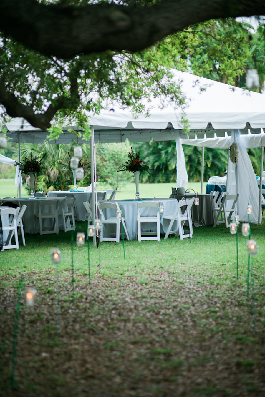 Outdoor, Tented Bradenton Garden Wedding Reception with Accent Candlelight