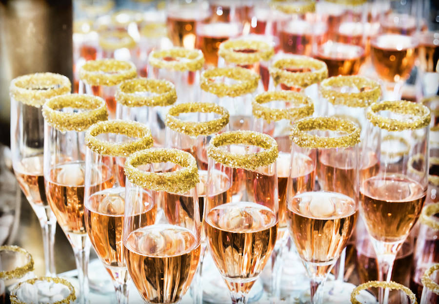 Gold. Sugar Rimmed Champagne Glasses at Wedding Reception Cocktail Hour | Specialty Wedding Drink