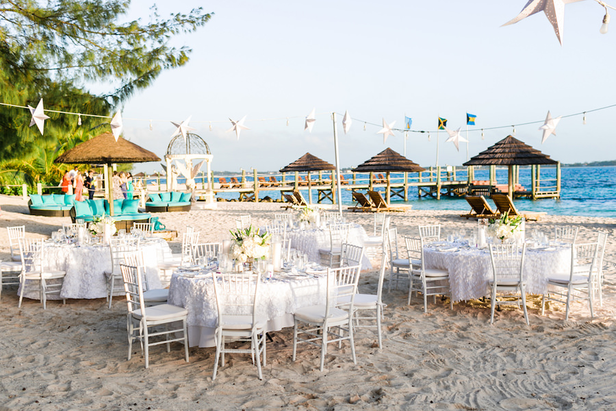 Outdoor Private Beach Wedding with White Linens and Chiavairi Chairs | White Wedding Inspiration | Sandals Royal Bahamian Bahamas Destination Honeymoon and Wedding | Wedding Photographer AlexisJuneWeddings