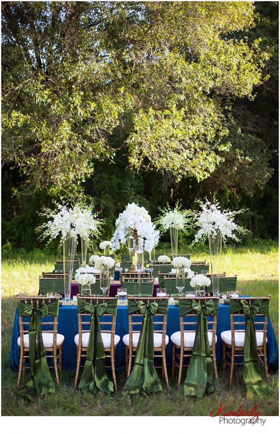 Outdoor Wedding Reception with Chiavari Chairs and Emerald Green Chair Sashes and Blue Table Linens | Tampa Bay Wedding Rental Linens by Connie Duglin Specialty Linens