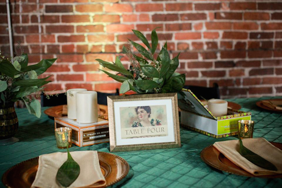 Cuban Inspired Wedding Reception Decor with Cigar Box Centerpiece and Emerald Tablecloth |Tampa Bay Rental Linens by Connie Duglin Specialty Linens