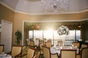 Elegant Indoor Tampa Wedding Venue with Tall Centerpieces and Chandeliers | The Tampa Club