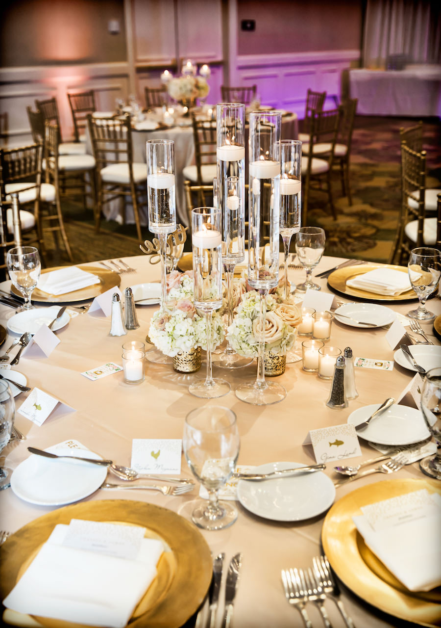 Wedding Reception Table Decor with Gold Chargers, Candles Floating in Water, and Pink and Ivory Floral Wedding Centerpieces | Elegant, Romantic Wedding Reception Inspiration ideas
