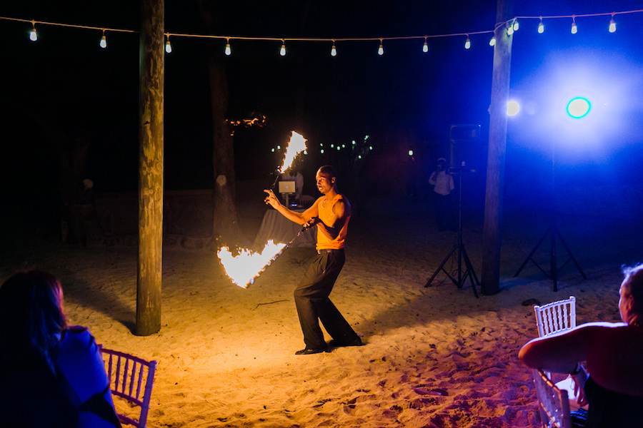 Outdoor Beach Wedding with Live Fire Twirler Entertainment | White Wedding Inspiration | Sandals Royal Bahamian Bahamas Destination Honeymoon and Wedding | Wedding Photographer AlexisJuneWeddings