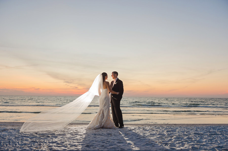 Sunset, Florida Beach Waterfront Bride and Groom Wedding Portrait | Tampa Wedding Photographer Marc Edwards Photographs