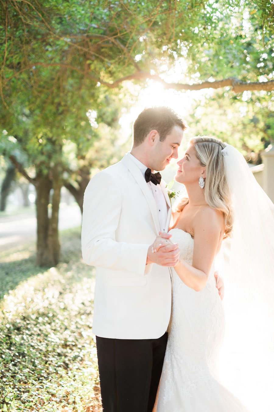 Outdoor, Bride and Groom Tampa Wedding Portrait in White Tuxedo Jacket and Strapless, Lace Matthew Christopher Wedding Dress and Veil