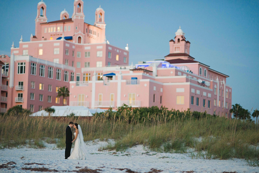 Outdoor, Florida Beach Waterfront Bride and Groom Wedding Portrait at Tampa Wedding Venue Loews Don CeSar Hotel | Tampa Wedding Photographer Marc Edwards Photographs