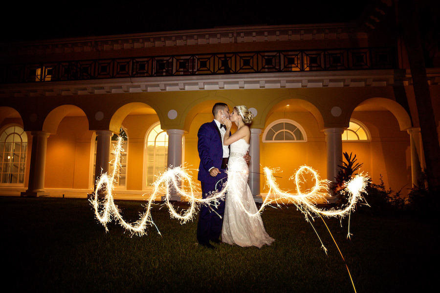 Outdoor, Nighttime Bride and Groom Wedding Portrait with Love Written in Sparklers | Tampa Wedding Venue Tampa Palms Golf and Country Club