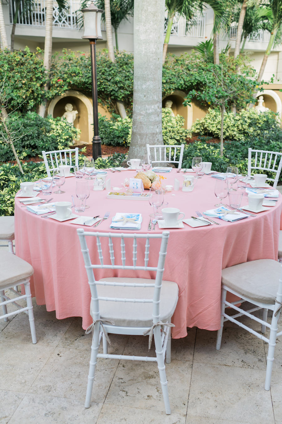 White and Pink Wedding Reception Inspiration with White Chiavari Chairs | Travelmoons: Sandals Royal Bahamian Bahamas Destination Honeymoon and Wedding | Wedding Photographer AlexisJuneWeddings