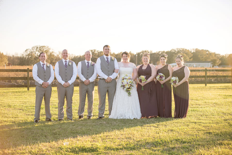 Plant City Outdoor Bridal Party Wedding Portrait in Purple Bridesmaids Dresses and Grey Groomsmen Suits