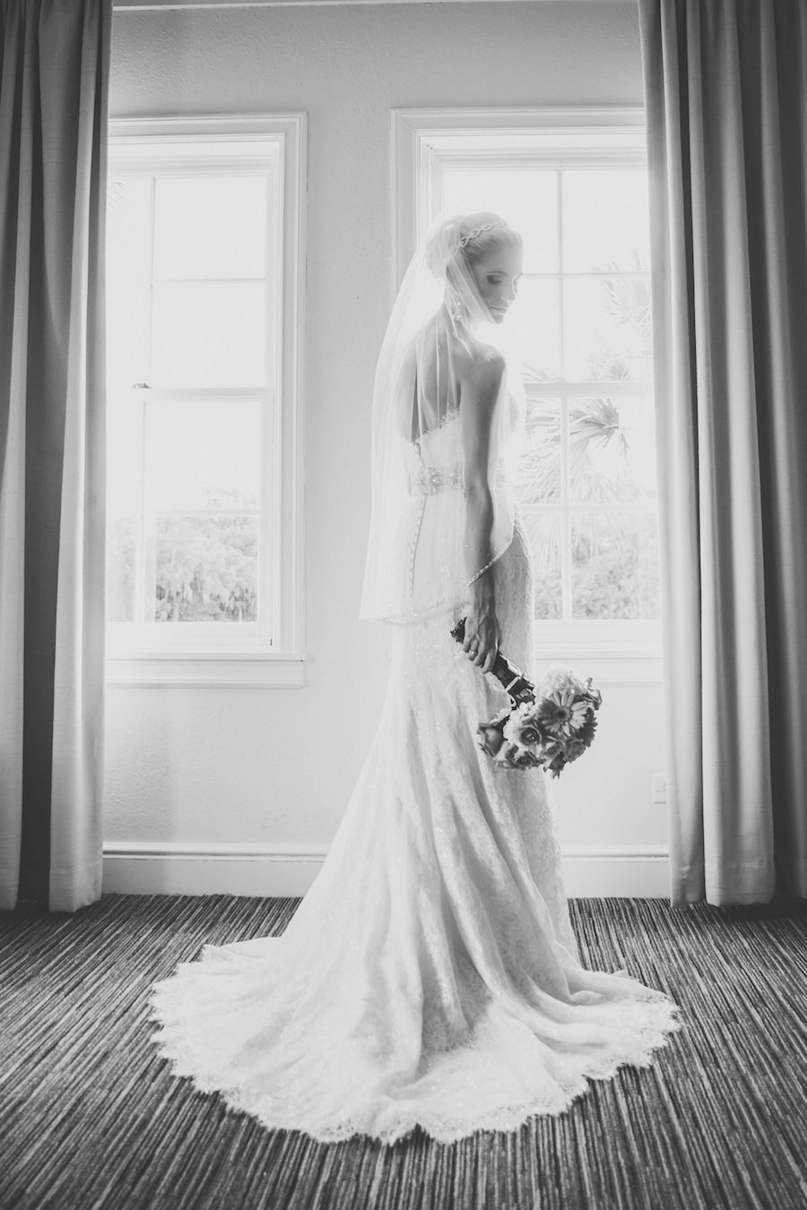 Bridal Wedding Portrait in Window in Lace, White Wedding Dress and Crystal, Rhinestone Belt