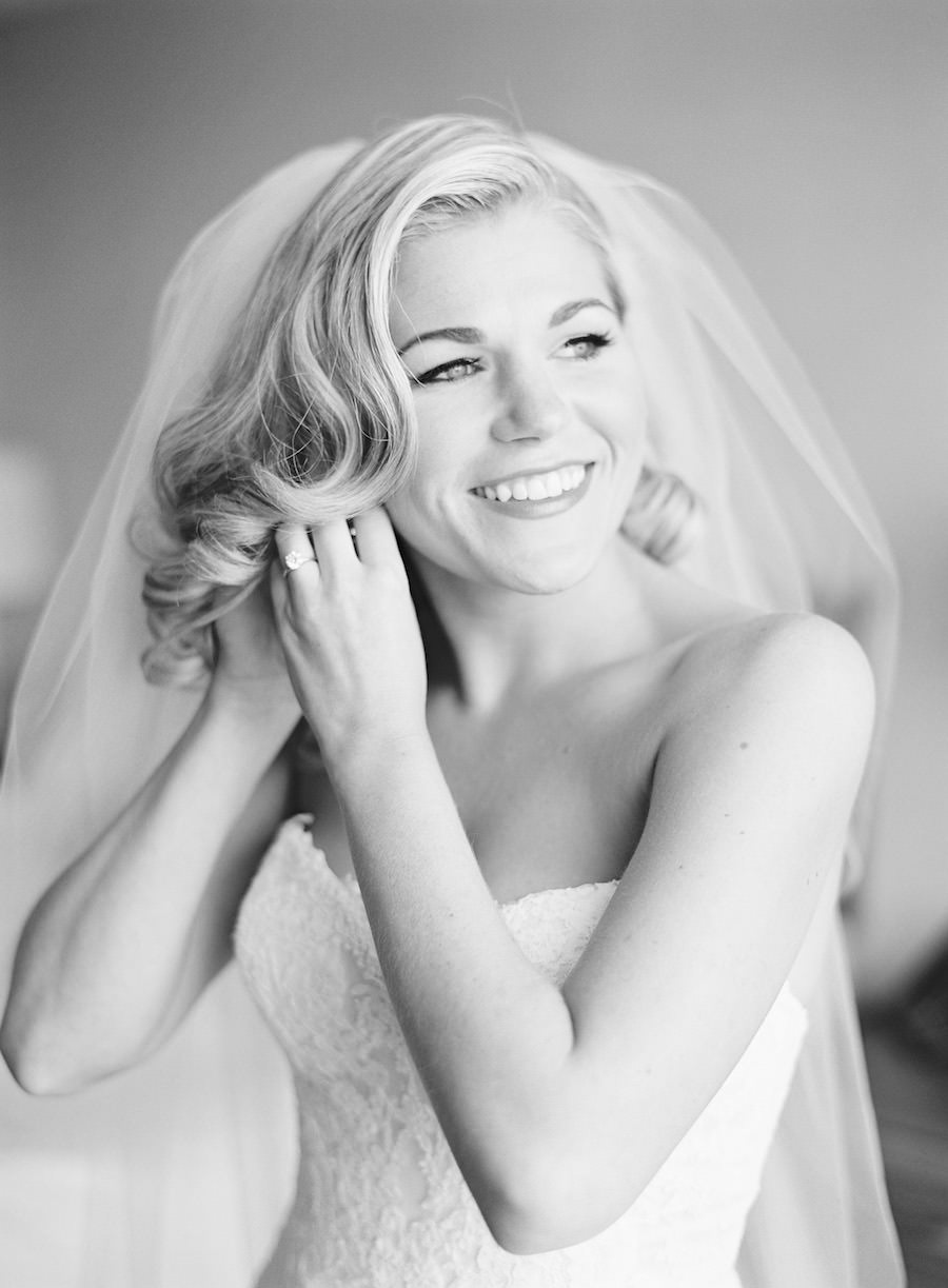 Bridal Wedding Getting Ready Portrait | Putting on Earrings in Ivory, Strapless, Lace Wedding Dress and Veil