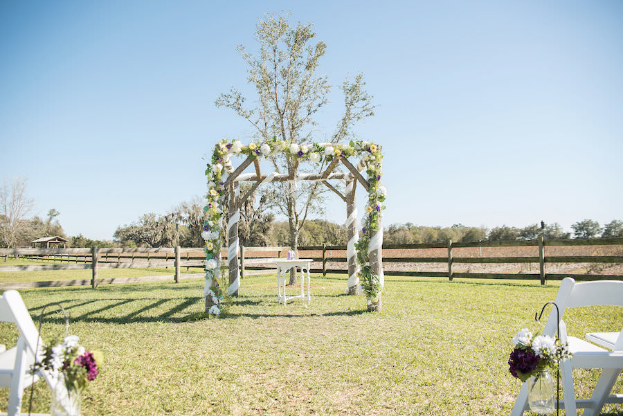 Outdoor, Plant City Wedding Ceremony with Wooden, Floral Accent Altar