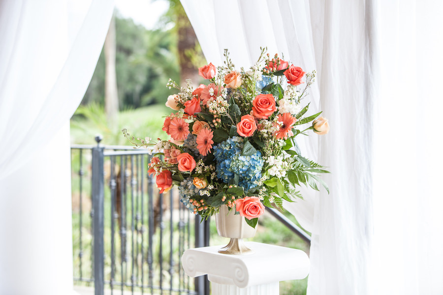 Outdoor Wedding Ceremony Decor with Blue and Coral Altar Flower Centerpieces and Draping
