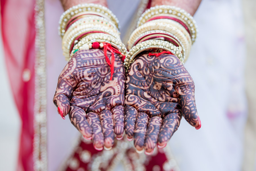 Indian Bridal Henna Wedding Portrait with Red, Gold and White Panetar