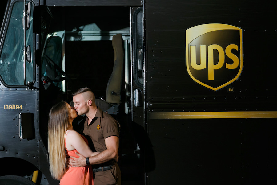 Tampa Couple Engagement Portrait Outside UPS Truck | Fiancé Works For UPS Engagement Shoot | Unique Engagement Session Ideas | Tampa Fl Wedding Photographer Carrie Wildes Photography
