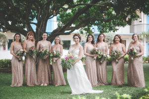 Bride and Bridesmaids, Outdoor Wedding Portrait in Gold, Sequin, Beaded Adrianna Papel Bridesmaids Dresses and Green, Pink, And Ivory Floral Bouquets