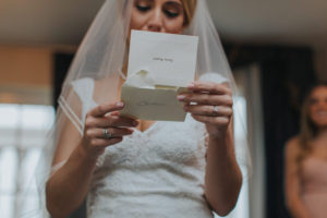 Bride Crying, Reading Letter From Groom on Wedding Day