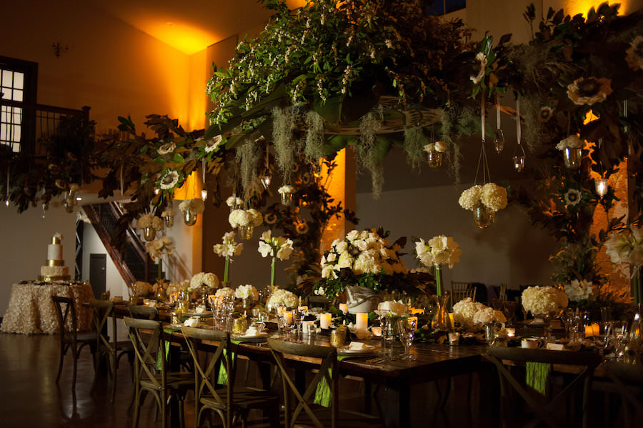 Forest-Inspired Green and Ivory Wedding Reception Décor with Hydrangea, Magnolia Trees and Cascading Moss with Mahogany Table and Chairs | Wedding Reception Décor Ideas | Fall Wedding Inspiration | Nature Inspired Wedding Decor