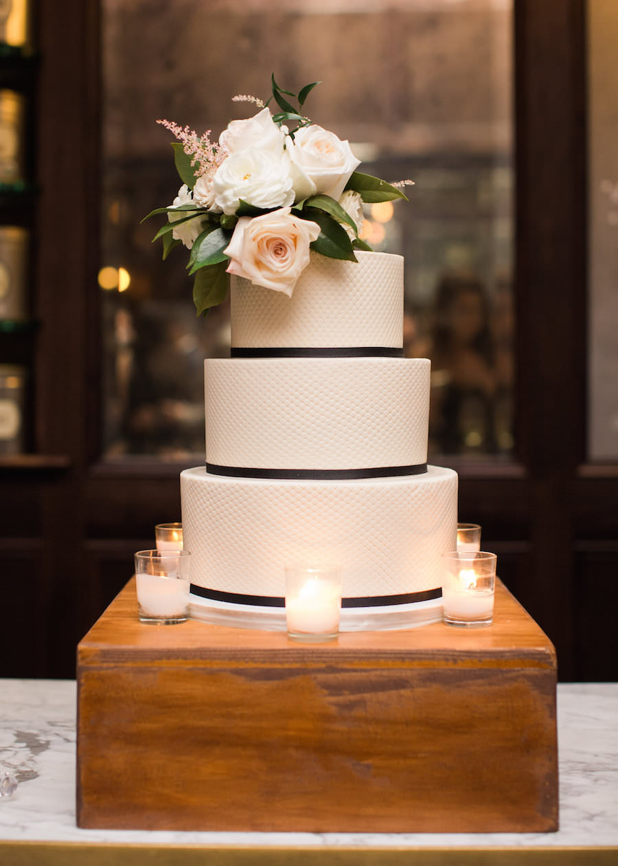 Three Tiered White Textured Round Wedding Cake with Black Ribbon Accent and Fresh Ivory and Pink Rose Caketopper | Tampa Wedding Cakes and Desserts Hands on Sweets