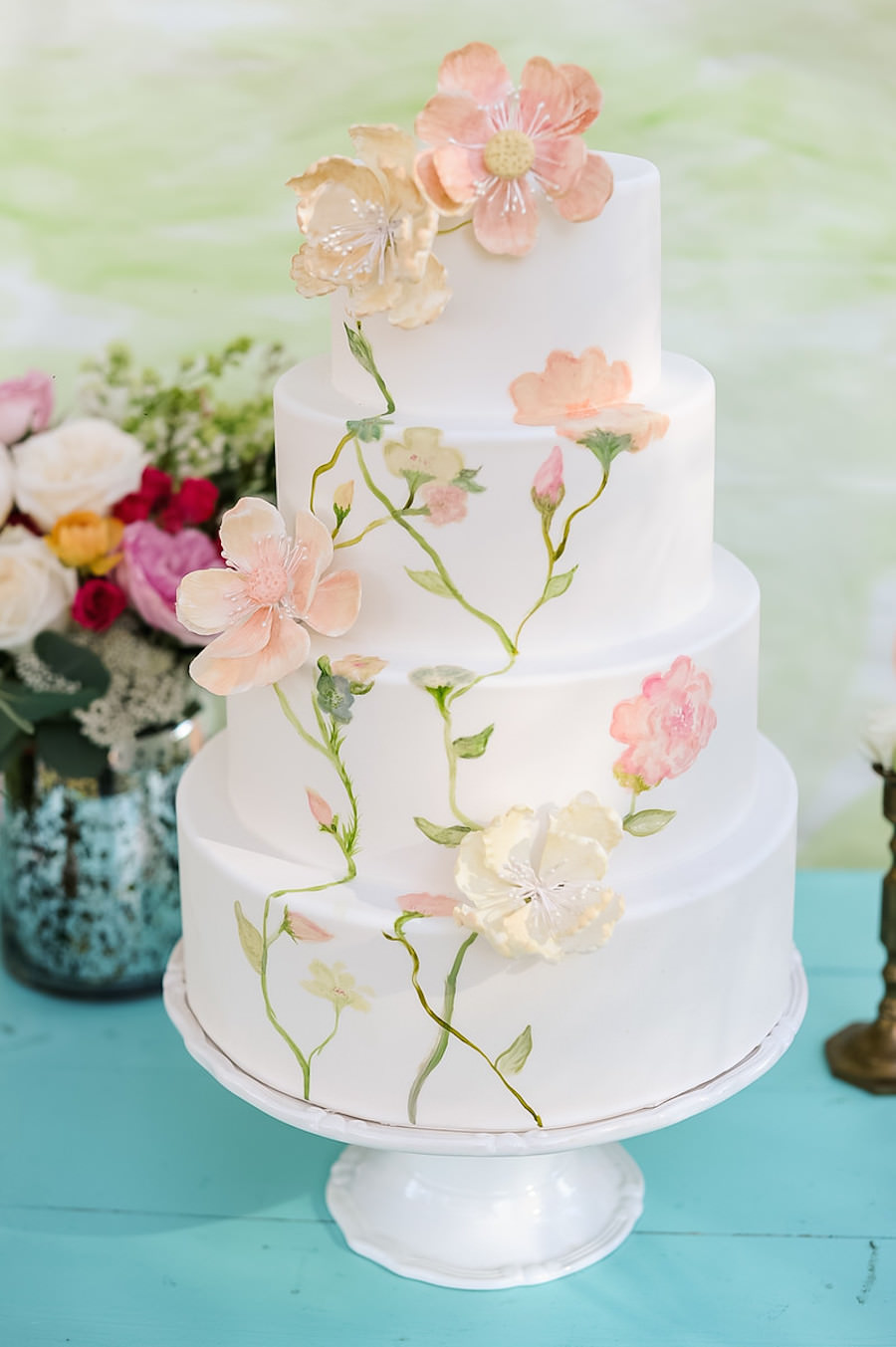 Four Tiered White Handpainted Wedding Cake with Pastel Floral Accents and Sugar Flowers | Tampa Wedding Cakes and Desserts Hands on Sweets