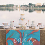 Wedding Cake Dessert Table with Gold Sequin Tablecloth and Assorted Round Wedding Cakes | Tampa Wedding Cakes and Desserts Hands on Sweets