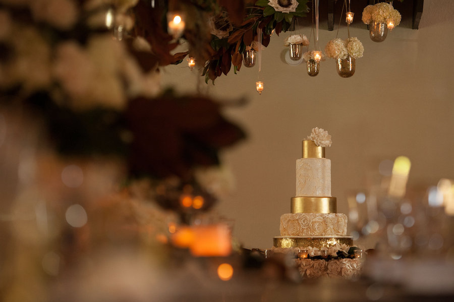 Four Tier Gold Foil and Ivory Round Wedding Cake with Hand Painted Sugar Flowers